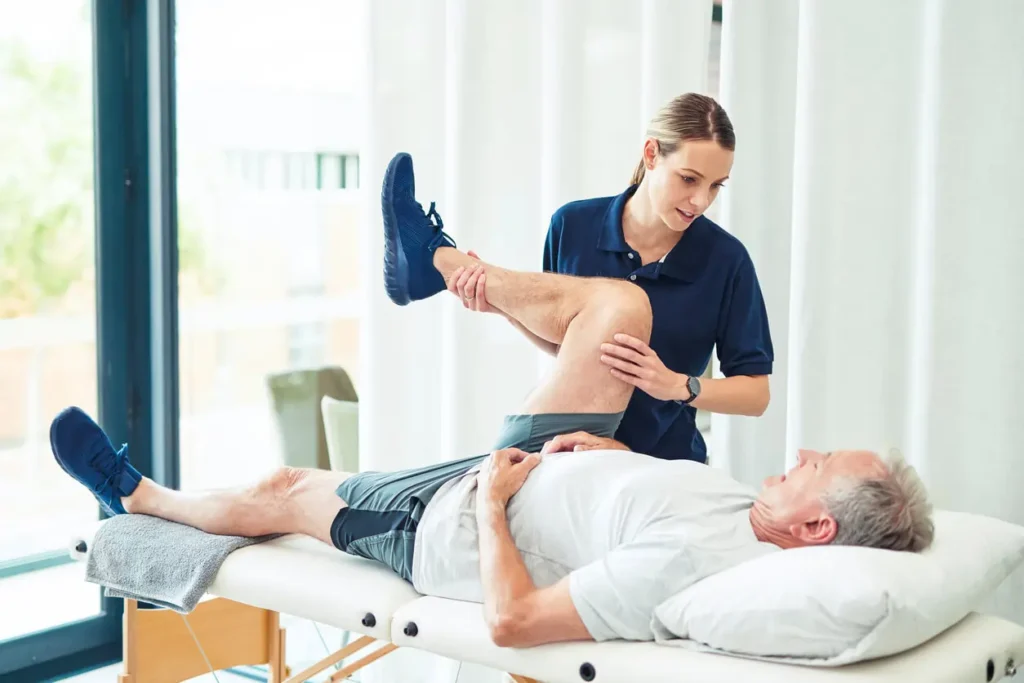 Revitalising Recovery: Effective Rehabilitation Strategies for Muscle Injuries 3 Physiotherapist assisting a patient with muscle recovery exercises Bakewell