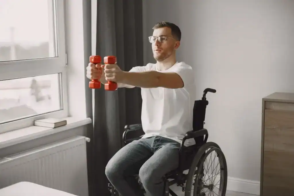 Image of man doing exercise in his wheelchair to aid weight loss Bakewell